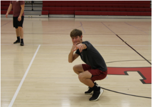 Sophomore, Ty Gillum poses mid game when his team was up 12-6. We asked Ty what it’s like participating in basketball during team sports. He said, “It gets really competitive and everyone wants to win.”
