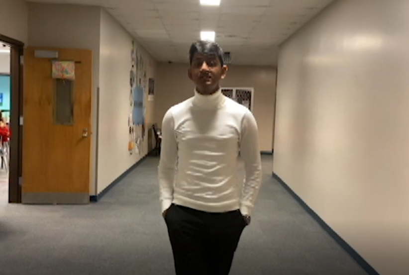 Munif Chowdbury is filmed in Interactive Media classes by Kaylan Howard for a project.