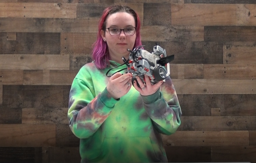 Akira Davidson shows the robot she programmed in AP Computer Science.