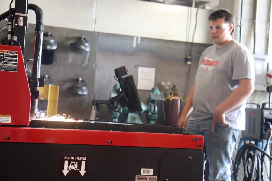 Travis Dewitt starts to work on carving out his Jack o Lantern for his Halloween themed welding project. When we asked Travis what his favorite part about welding was, he said, ”You can use your rod in many different ways and there are so many different things you can weld.”