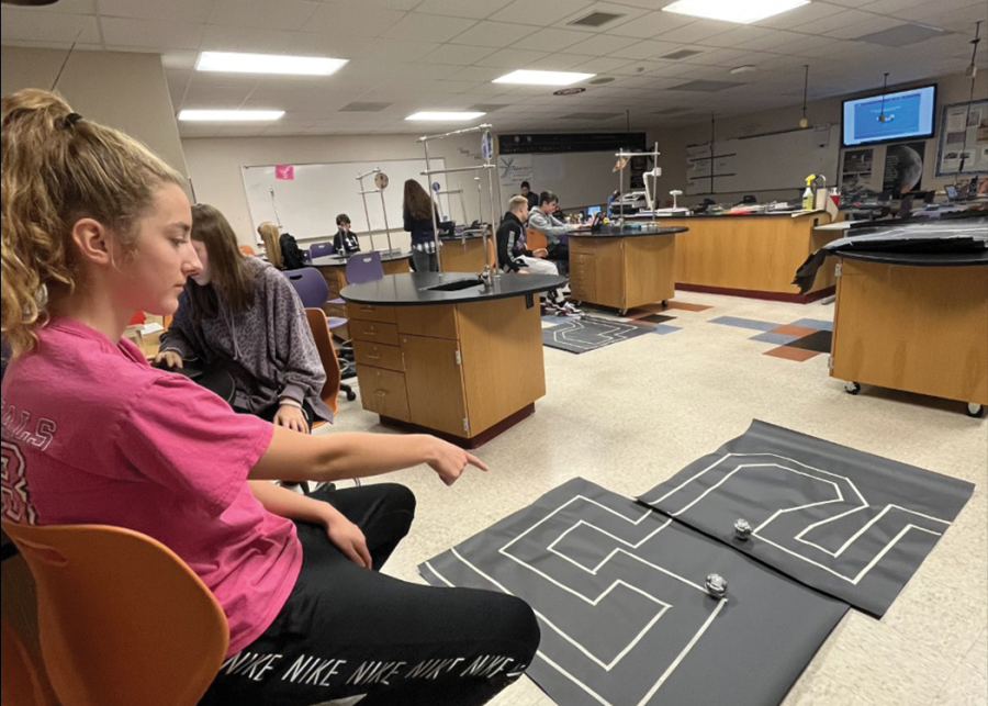 Junior Hannah Hodgen directs her robot through the maze in Mrs. Gilfords Earth & Space class.