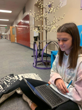 Kate Cocanower completes a test for her English teacher Mrs. Yoder. Kate is a freshman and says she is really enjoying high school so far. Her favorite part is her fun classes and being able to have her fun during the day which wasn’t allowed in Middle School.