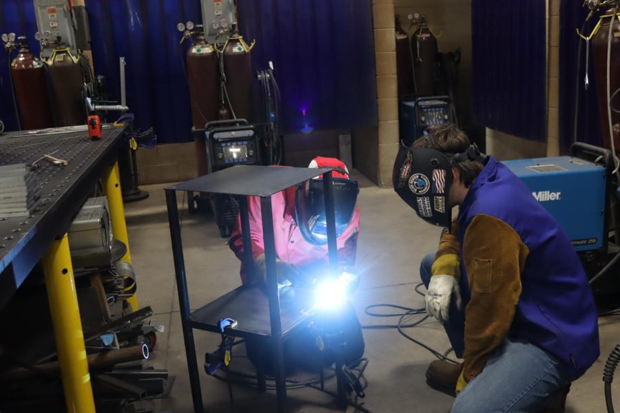 In Ms. Rosenbaums welding class, second year students are working on building a table. (Pictured is Carl Carter)
