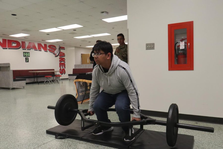 Marcos Rodriguez (9th grade) deadlifting in the lunchroom. Marcos Rodriguez said, It was easy at first, but once I got to the 20th lift I had to quit. 
